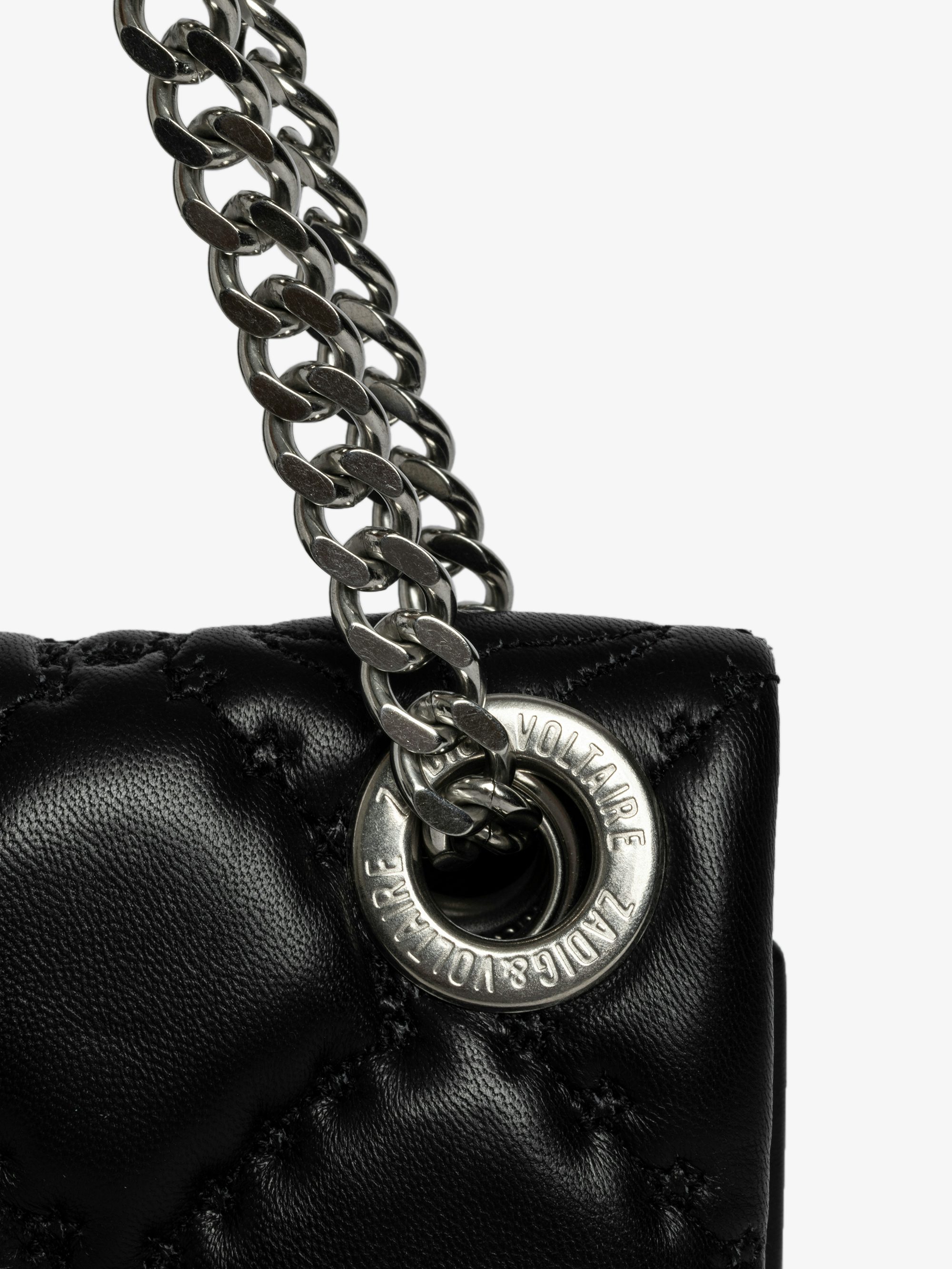 Rock II Quilted Monogram Clutch - Clutch in smooth quilted leather with adjustable metal chain and signature wings.